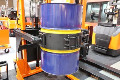 Drum lifted by drum stacker Stock Photos