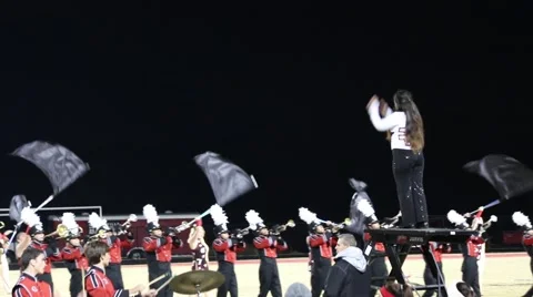 Drum Majorette Leads the Marching Band from Elevated Platform Stock Footage 43479246