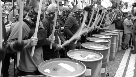 Drum rolls, blows, knocking on the drum - a "highlight" at the strike, rally. Stock Footage 134635817