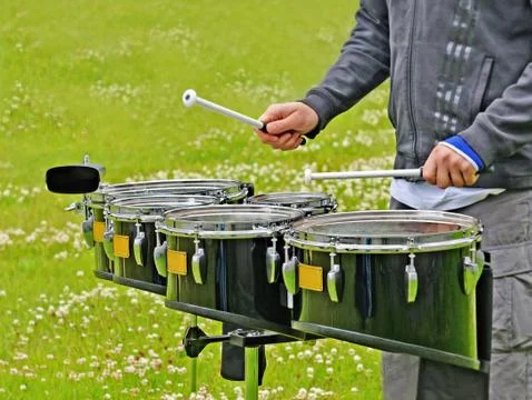 Drum set and drummer's hands. Stock Photos