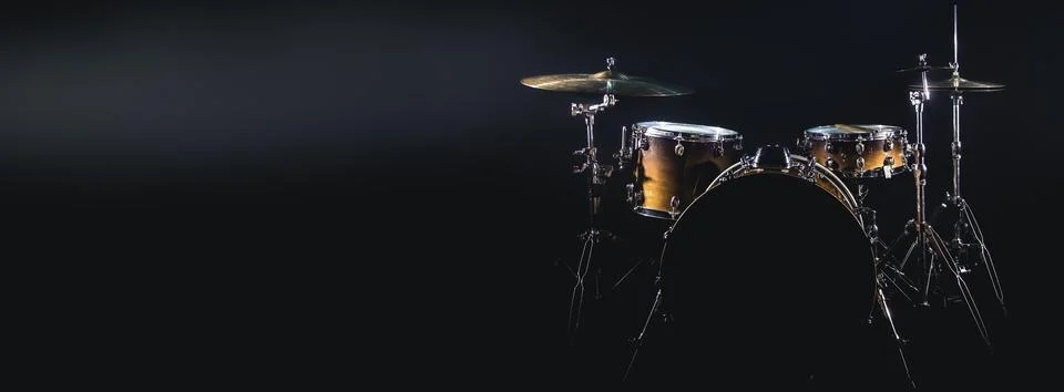 Drum set on a black background isolated, copy space. Stock Photos