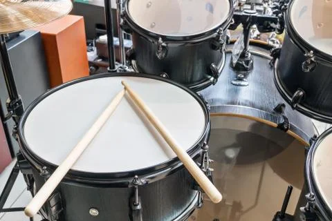 Drum set with drumsticks Stock Photos