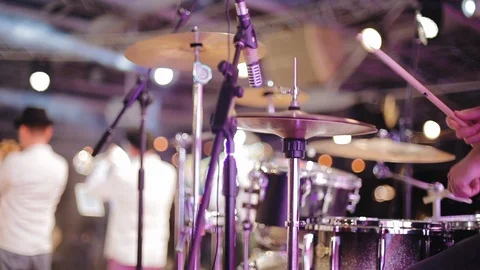 Drum set musical group on stage in the background playing a group of musicians Stock Footage 119174625