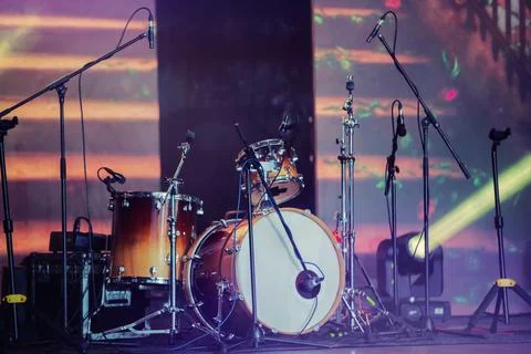 Drum set ready for performance at live music event in outdoor venue during .. Stock Photos