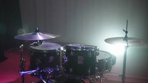 Drum set on the stage in the rays of light music. The Drum rig is ready for a Stock Footage 169587806