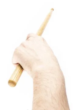Drum-stick in the hand isolate Stock Photos