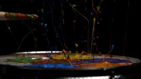 Drum Stick Hits Drum with Multi-paint Colors Splattering up Vídeo Stock 270404736