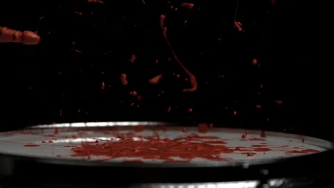 Drum Stick Hits Drum with Red Paint Splattering up Видео 270404695