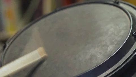 Drum Sticks Beating on Electric Floor Tom Stock Footage 83343305