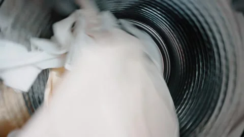 Drum washing machine washing clothes Stock Footage 295633038