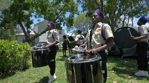 The drumline section of a marching band in Hollywood, Florida Stock Footage 50959619