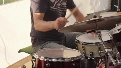The drummer behind the instruments Stock Footage 159897464