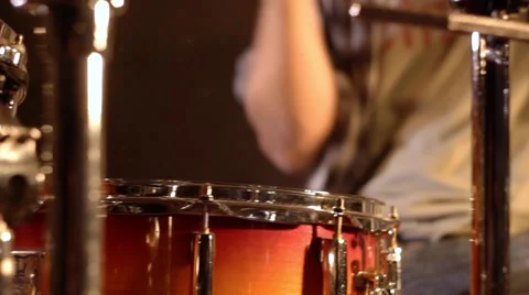 Drummer. Close-up on a snare drum aggressively played by a unsharp male 動画素材 59552930