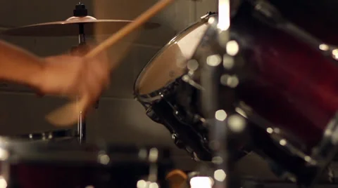 Drummer does multiple drum rolls on a drum set Stock Footage 35404938