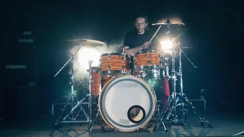 Drummer, drumset, drums in slow motion. Young drummer plays a drumkit. Stock Footage 128310756