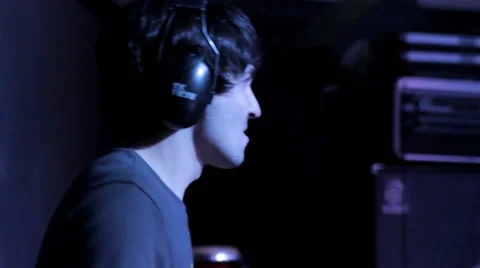 Drummer with headphones closeup Stock Footage 47842087