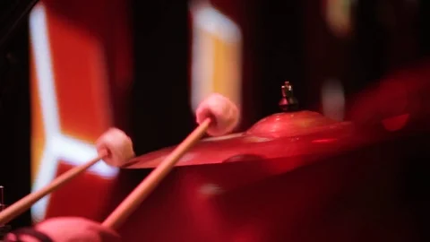 The drummer hits the drum-plate close-up. Video stock 74207644
