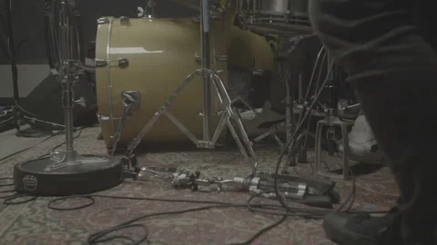 Drummer Kicking Drum Pedals Surrounded by Cords Stock-Footage 165609456
