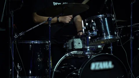 Drummer man without face with pleasure playing on black percussions drums close. Video stock 119980056
