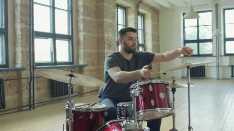 Drummer Mounting Hi-Hat on Drumset Stand Stock Footage 202267326