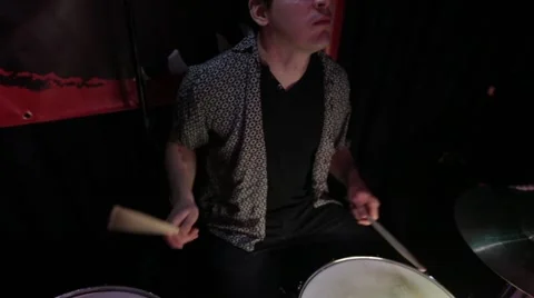 Drummer performing live on stage in night club Stock-Footage 50659974