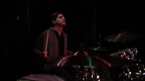 Drummer performing live on stage in night club Stock-Footage 50660429