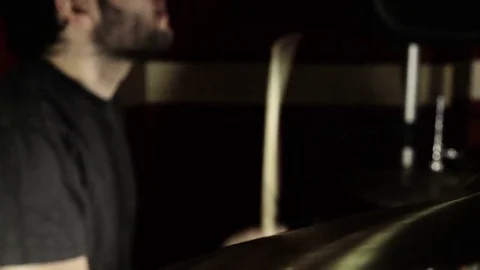 Drummer performing rock music in a practicing room Stock-Footage 72636324