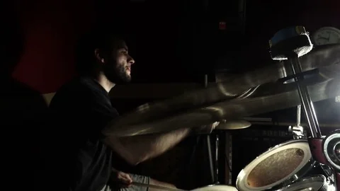 Drummer performing rock or heavy metal in the darkness on the stage Video stock 72638191