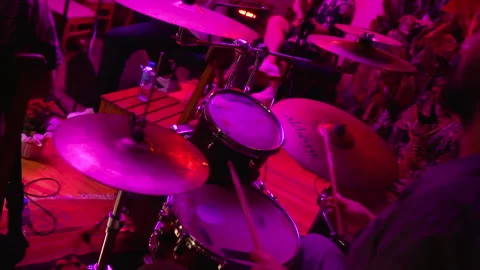 Drummer performing on stage with purple lighting in Izmir, Turkey June 23, 2023 Stock-Footage 331775131