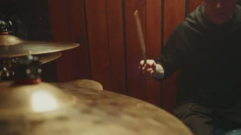 Drummer performs live in intimate setting showcasing skill and passion Stock Footage 305846505