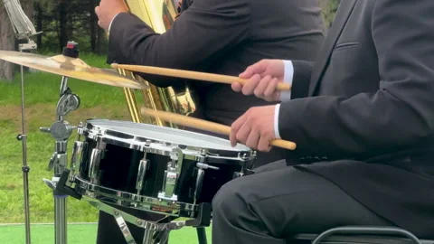 Drummer player in suit, skillfully playing snare drum in band. Stock Footage 310885479