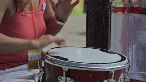 Drummer playing bongo drums at natire Stock Footage 63982510