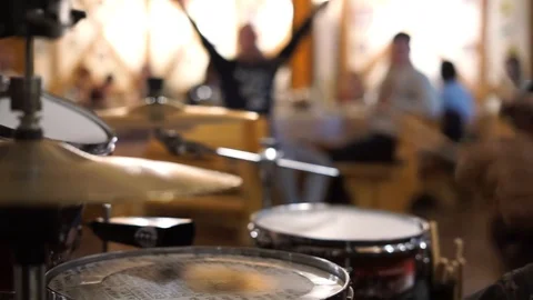 Drummer playing in a cafe Stock Footage 100897484