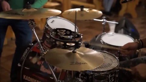 Drummer playing in a cafe Stock Footage 100897595