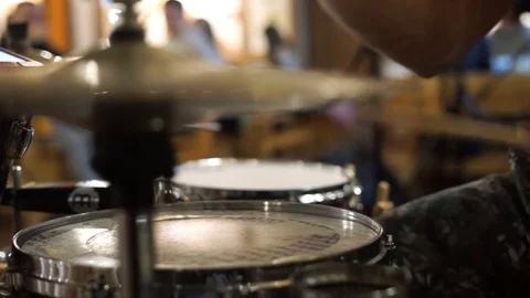 Drummer playing in a cafe Stock Footage 100897770