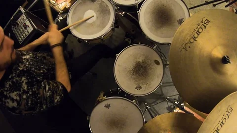 Drummer playing cymbal at a studio Stock Footage 101574793