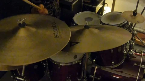 Drummer playing cymbal at a studio Stock Footage 101576167