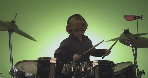 Drummer playing drum kit in slow motion Stock Footage 99990826