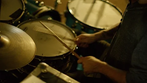Drummer playing drum set in the studio Stock Footage 108919502