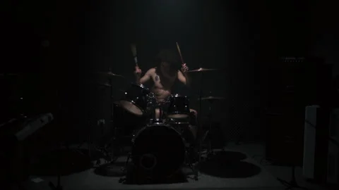 Drummer Playing the Drums in a dark place 스톡 동영상 258341687