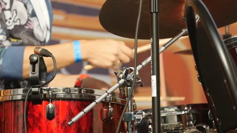 Drummer playing drums with drum sticks, close-up Stock Footage 145601792