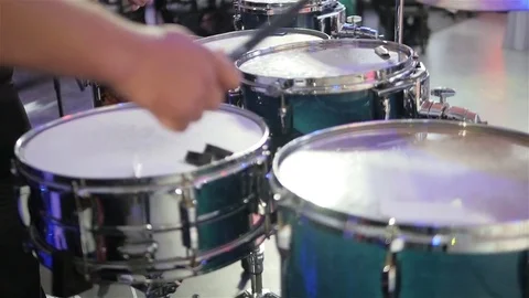 Drummer playing drums with drumsticks close up no face slow motion Stock Footage 70133640
