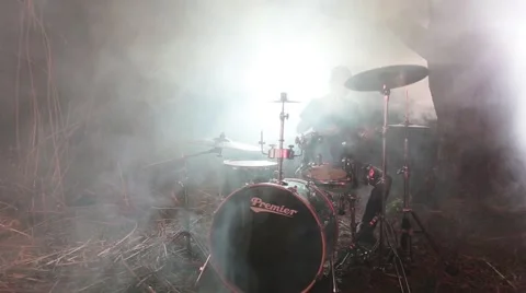 Drummer playing drums in the forest Stock Footage 52404119