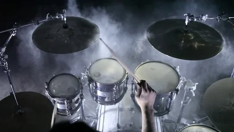 Drummer playing drums in the hangar Stock Footage 74117223