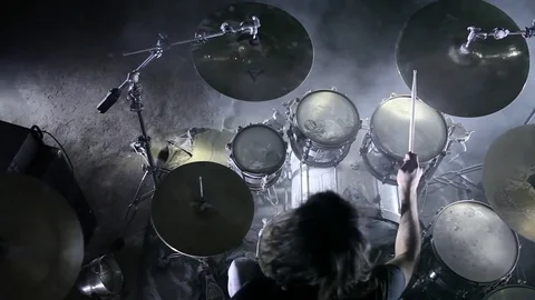 Drummer playing drums in the hangar Video stock 74117226