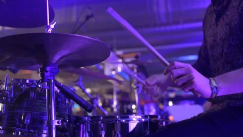 DRUMMER PLAYING DRUMS, HI HAT OPENS, BLUE PURPLE LIGHT Stock Footage 128359248