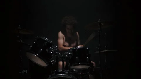 A Drummer Playing the Drums by himself 스톡 동영상 258335977