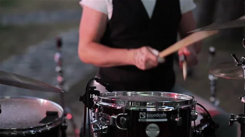 Drummer playing the drums at a party. Slow motion Stock Footage 59108727