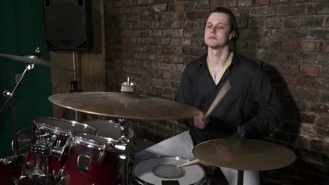Drummer playing the drums slow motion Stock Footage 74210117