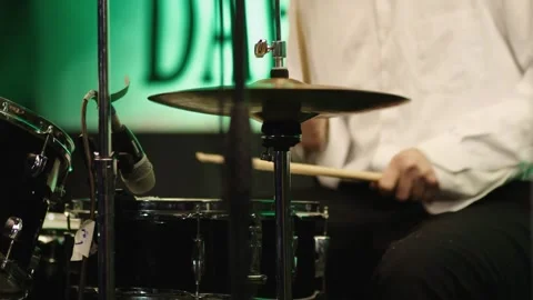 Drummer playing the drums on stage at a rock concert. Musical performance. Stock Footage 304324801